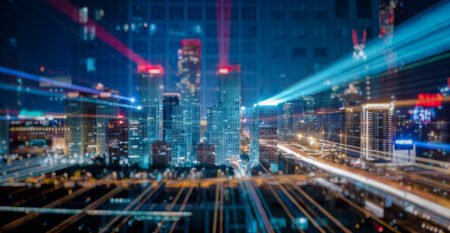 Light trails above buildings